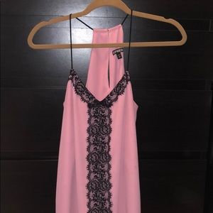 Sleeveless pink top with black lace